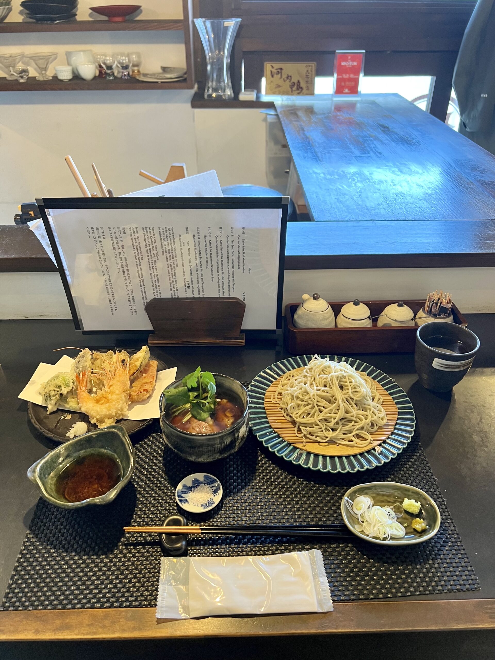 A bowl of duck buckwheat noodles with seasonal tempura